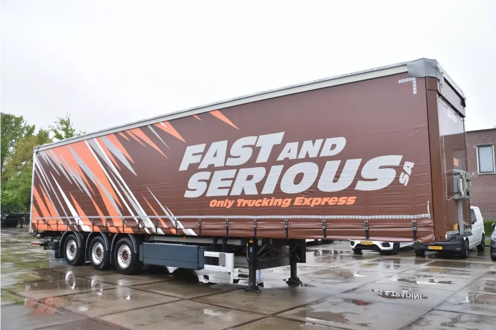 Fruehauf SLIDING CURTAINS/ROOF - TOPLIFT SYSTEM - LIFT AXLE - STEERING AXLE - SAF AXLES - ALCOA'S - DHOLLANDIA - TOP CONDITION -