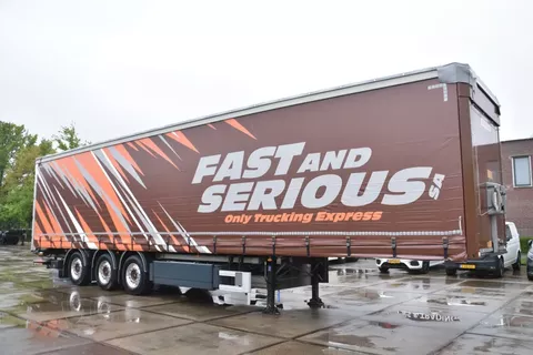 Fruehauf SLIDING CURTAINS/ROOF - TOPLIFT SYSTEM - LIFT AXLE - STEERING AXLE - SAF AXLES - ALCOA'S - DHOLLANDIA - TOP CONDITION -